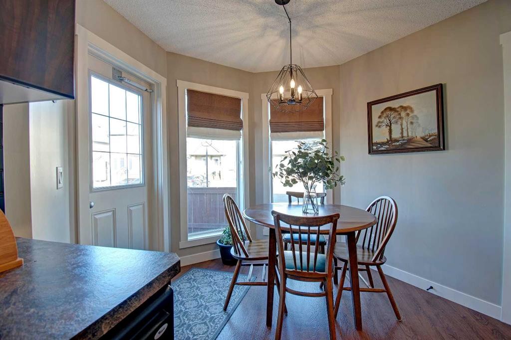 1606-2445 Kingsland Road Se, Airdrie, AB - Indoor Photo Showing Dining Room