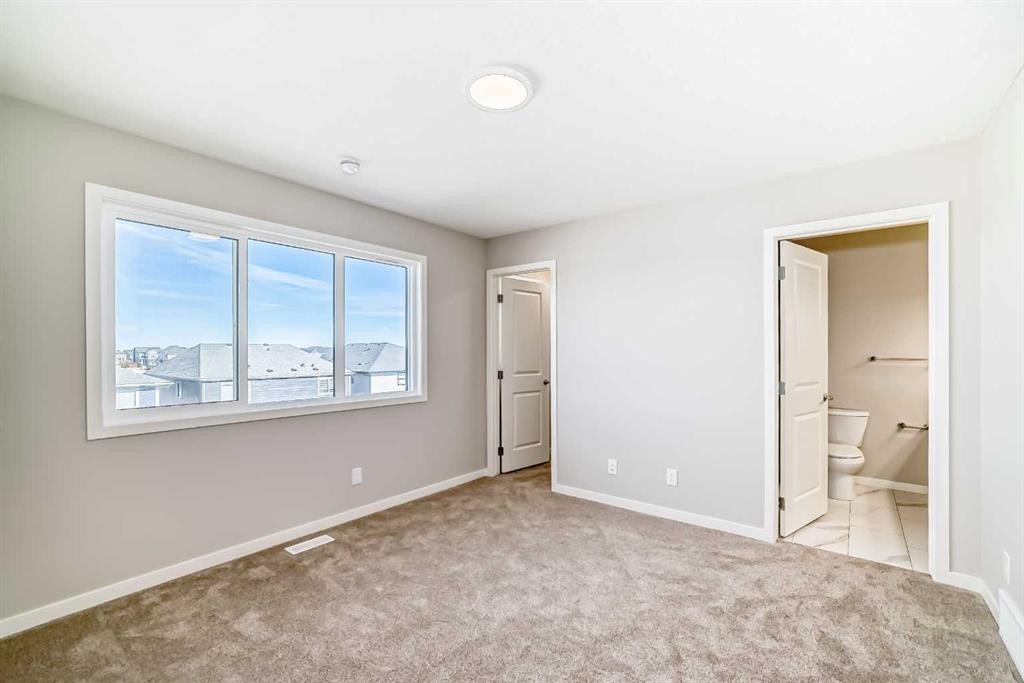 77 Mercado Landing Se, Calgary, AB - Indoor Photo Showing Other Room