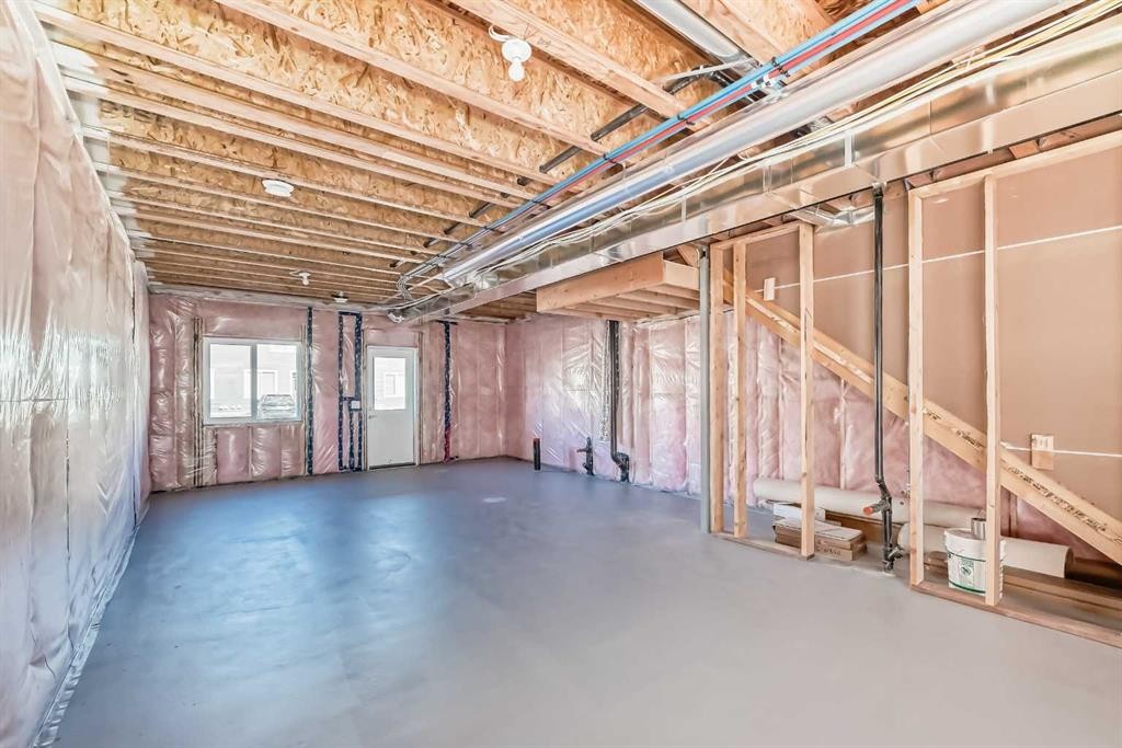 77 Mercado Landing Se, Calgary, AB - Indoor Photo Showing Basement