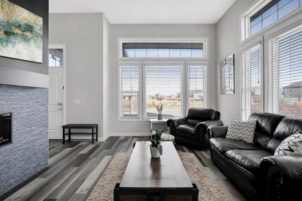 273 Masters Road Se, Calgary, AB - Indoor Photo Showing Living Room With Fireplace