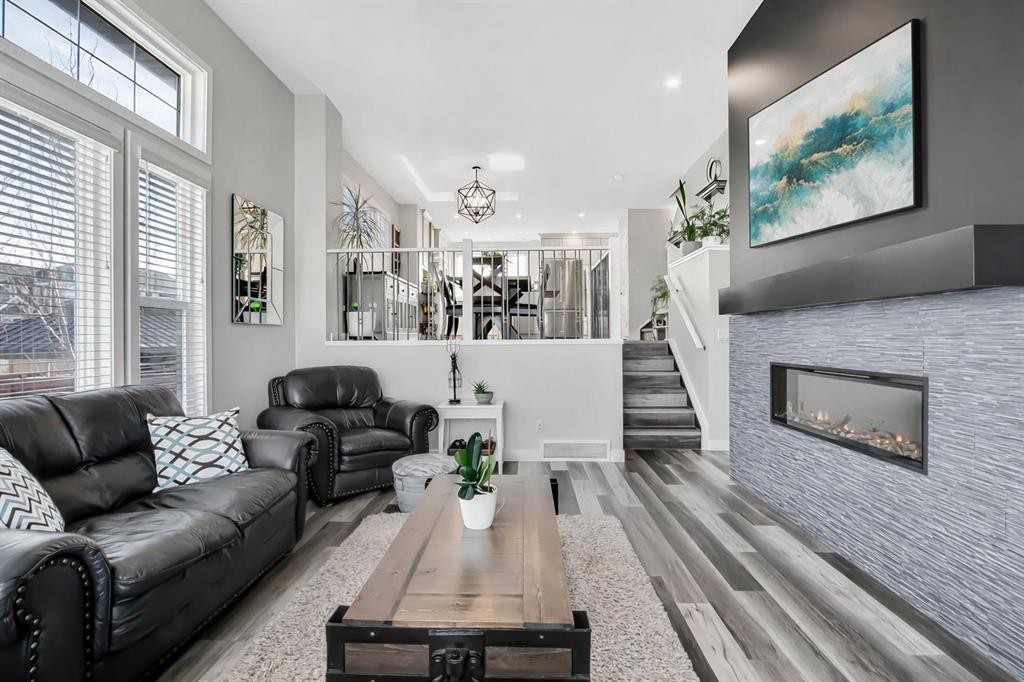 273 Masters Road Se, Calgary, AB - Indoor Photo Showing Living Room With Fireplace