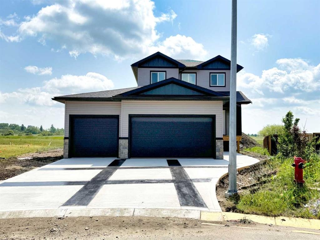 1207 Westview Drive, Bowden, AB - Outdoor With Facade