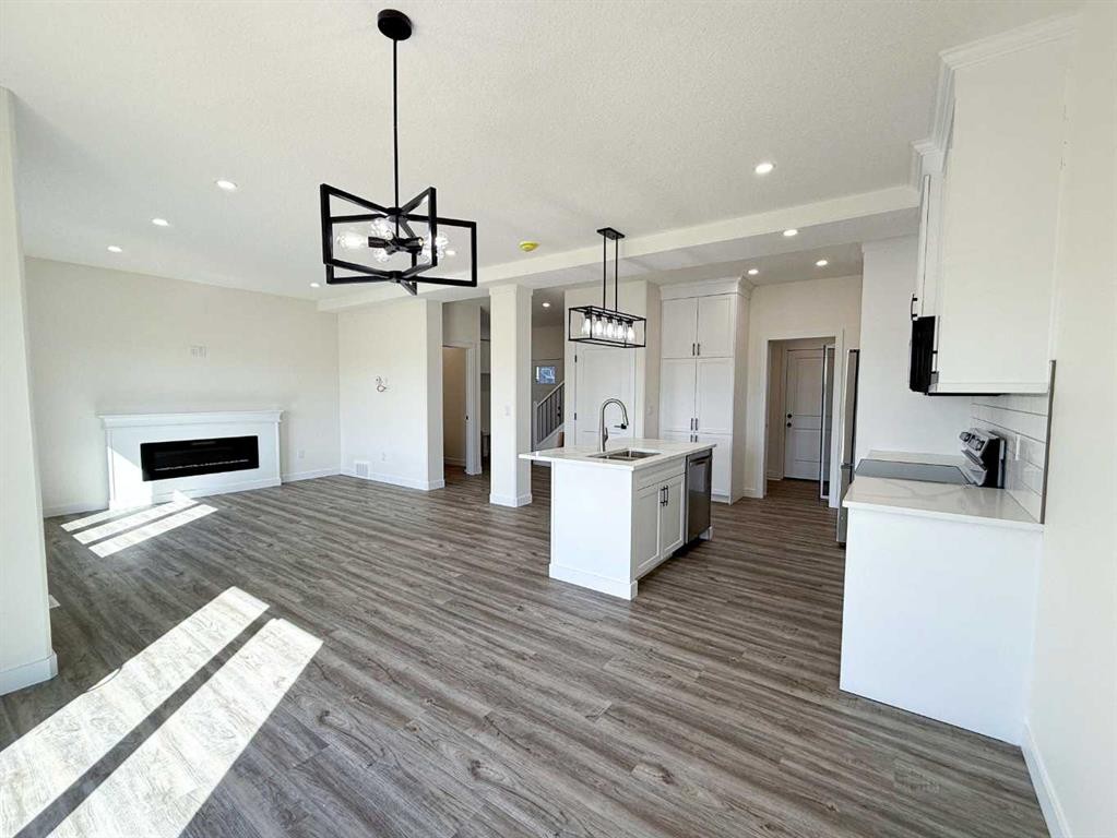 1207 Westview Drive, Bowden, AB - Indoor With Fireplace