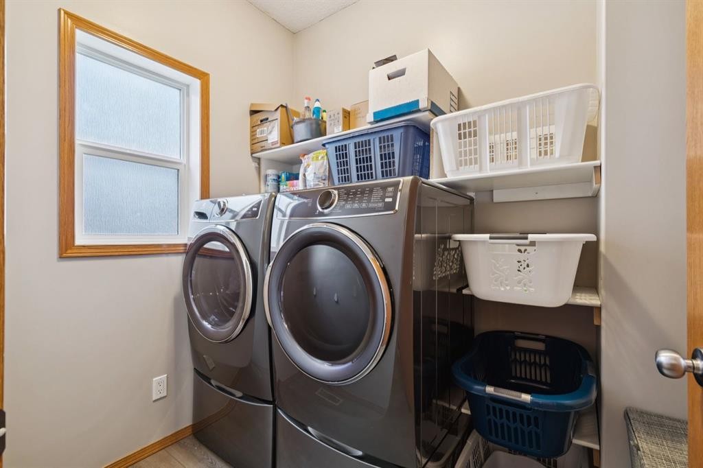 2841 Coopers Manor Sw, Airdrie, AB - Indoor Photo Showing Laundry Room