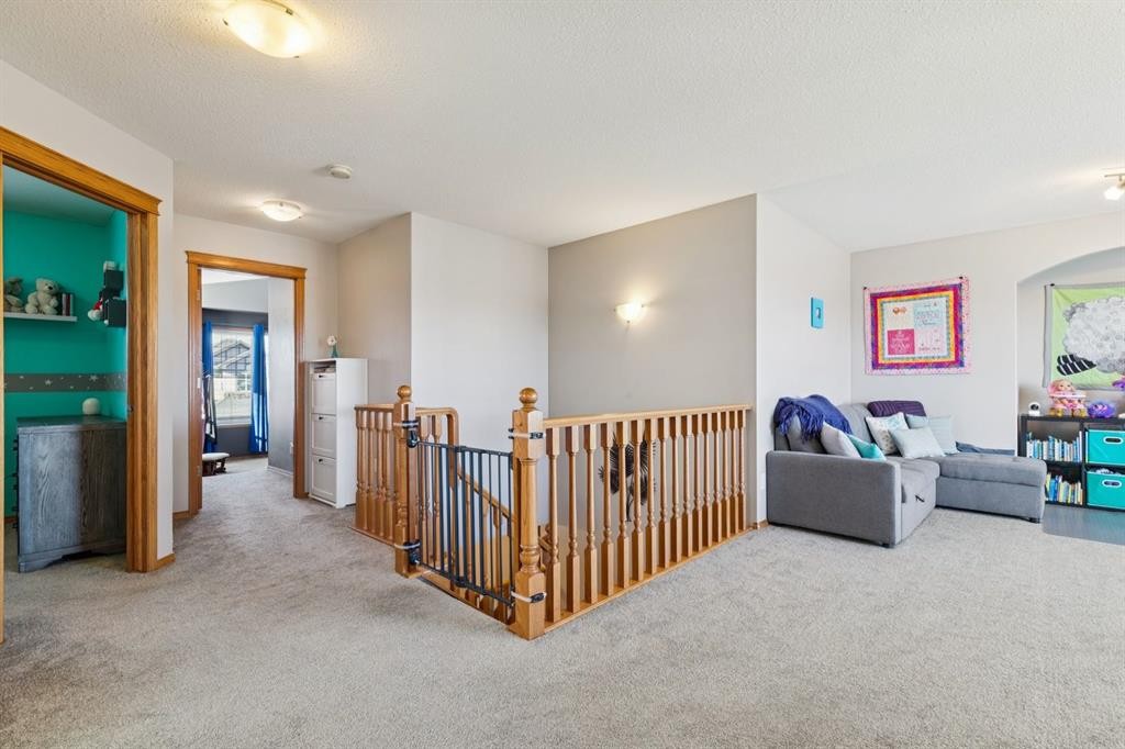 2841 Coopers Manor Sw, Airdrie, AB - Indoor Photo Showing Other Room