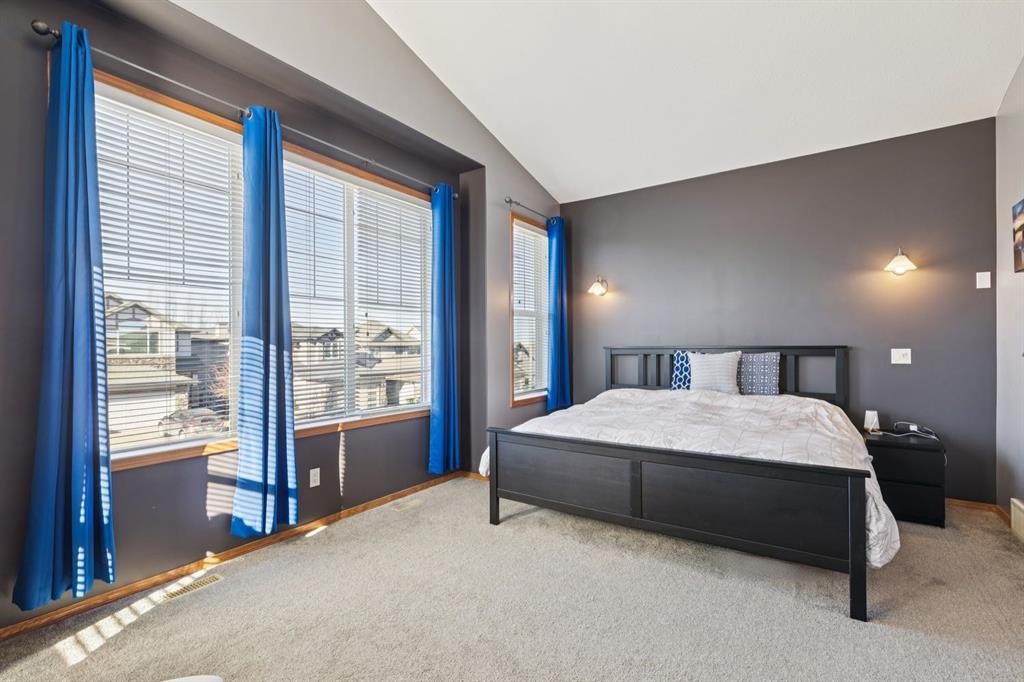 2841 Coopers Manor Sw, Airdrie, AB - Indoor Photo Showing Bedroom