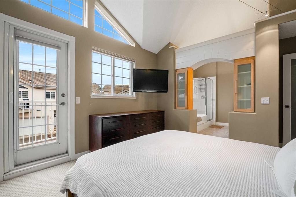 702 Patterson View Sw, Calgary, AB - Indoor Photo Showing Bedroom