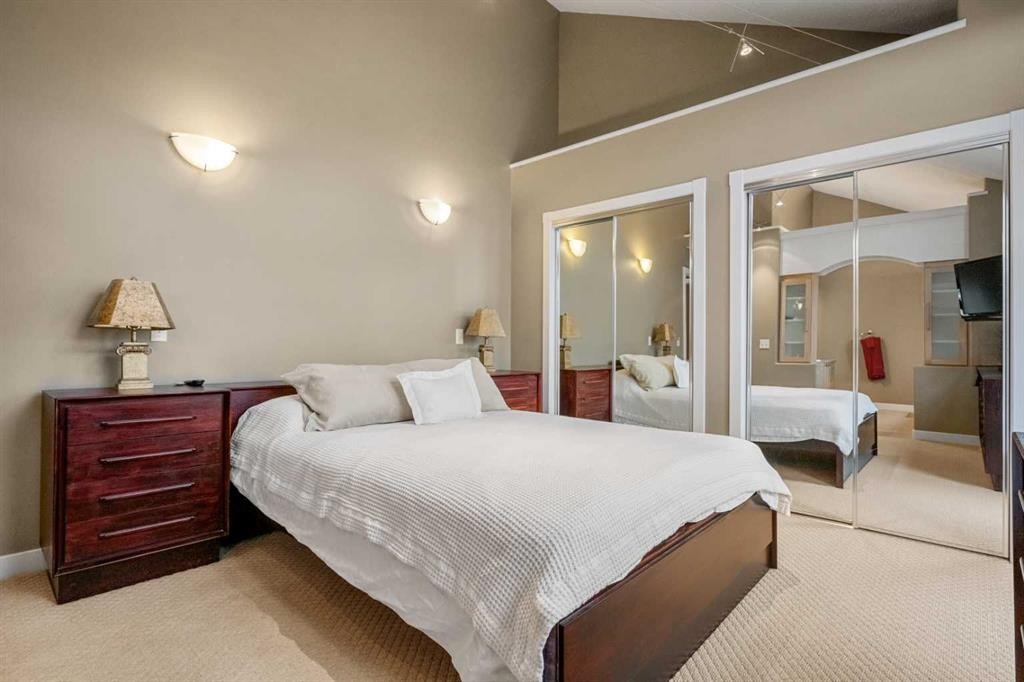 702 Patterson View Sw, Calgary, AB - Indoor Photo Showing Bedroom