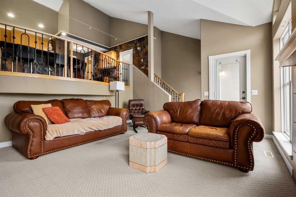 702 Patterson View Sw, Calgary, AB - Indoor Photo Showing Living Room