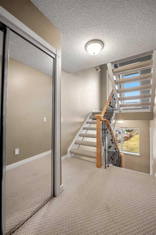 702 Patterson View Sw, Calgary, AB - Indoor Photo Showing Other Room