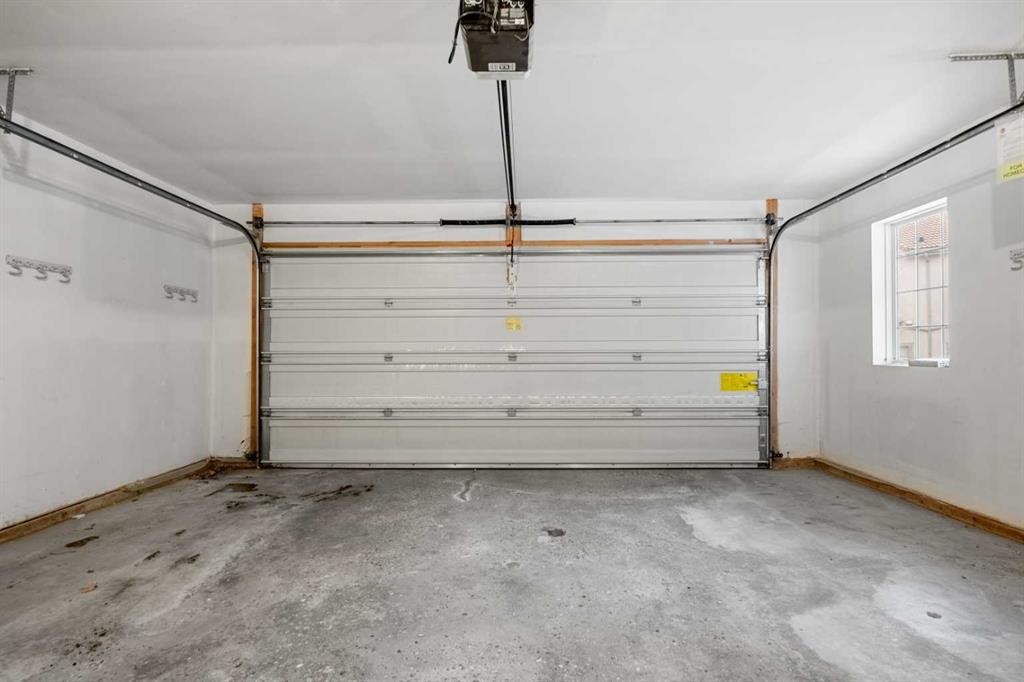 702 Patterson View Sw, Calgary, AB - Indoor Photo Showing Garage