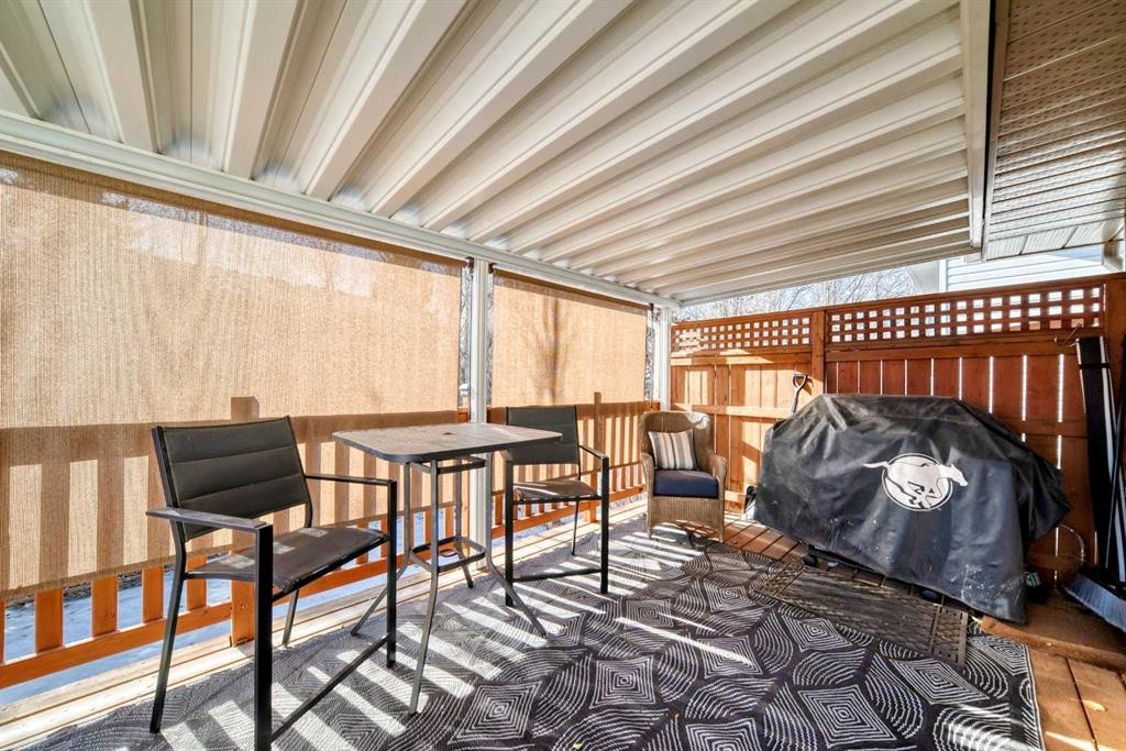 7 Sunset Crescent, Okotoks, AB - With Deck Patio Veranda With Exterior