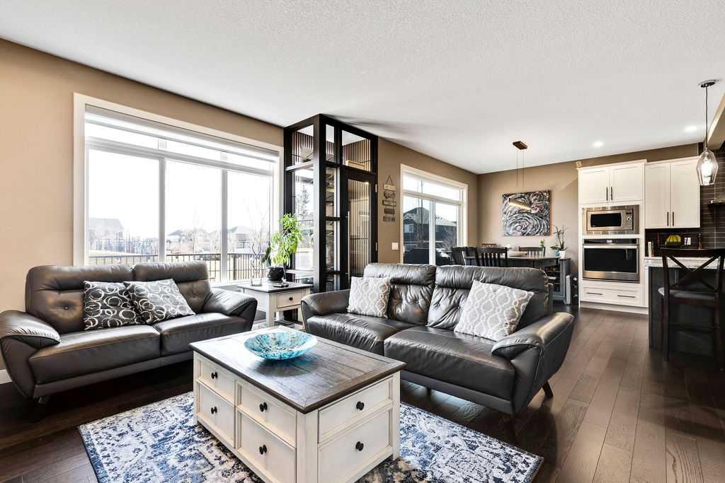 205 Aspenmere Way, Chestermere, AB - Indoor Photo Showing Living Room