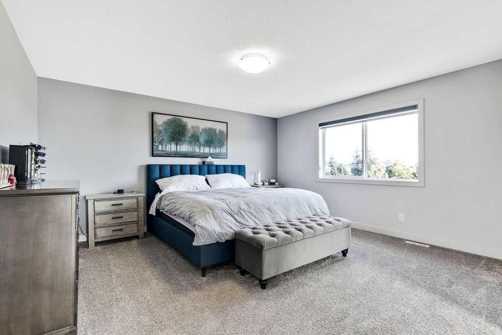 205 Aspenmere Way, Chestermere, AB - Indoor Photo Showing Bedroom