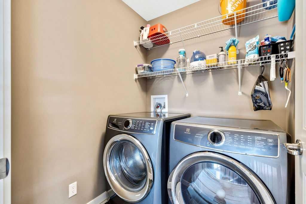 205 Aspenmere Way, Chestermere, AB - Indoor Photo Showing Laundry Room