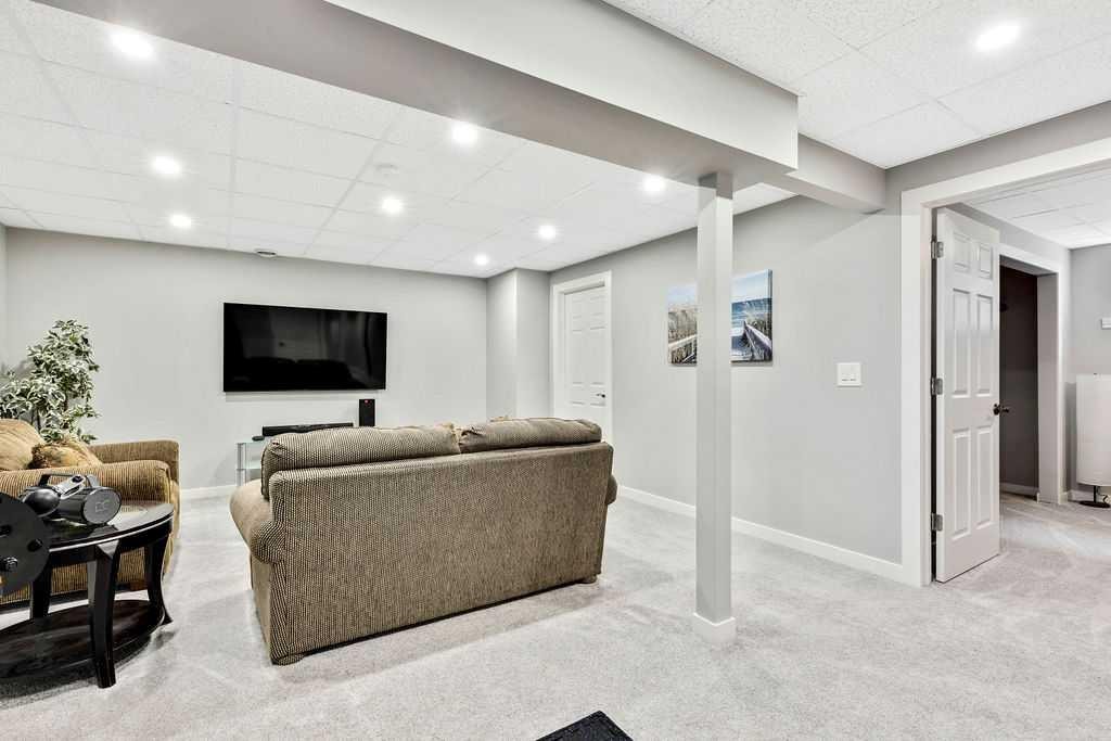 205 Aspenmere Way, Chestermere, AB - Indoor Photo Showing Basement