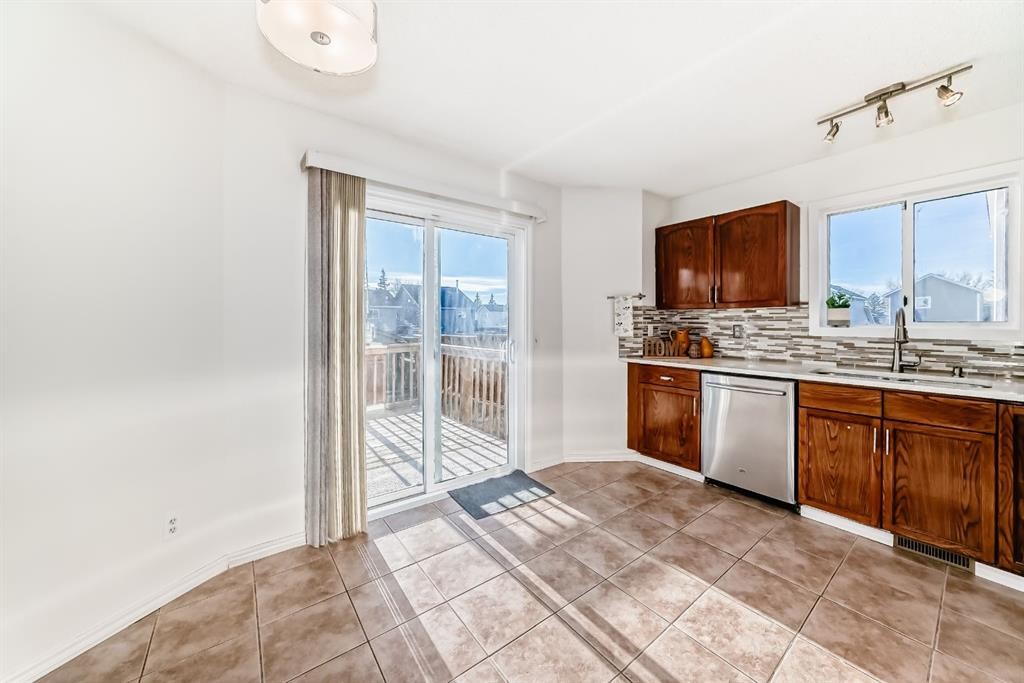 11 Martinridge Place Ne, Calgary, AB - Indoor Photo Showing Kitchen With Double Sink