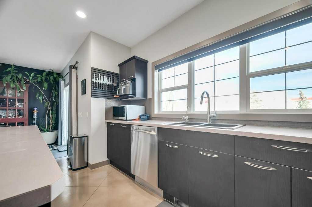 26 Copperfield Common Se, Calgary, AB - Indoor Photo Showing Kitchen With Double Sink