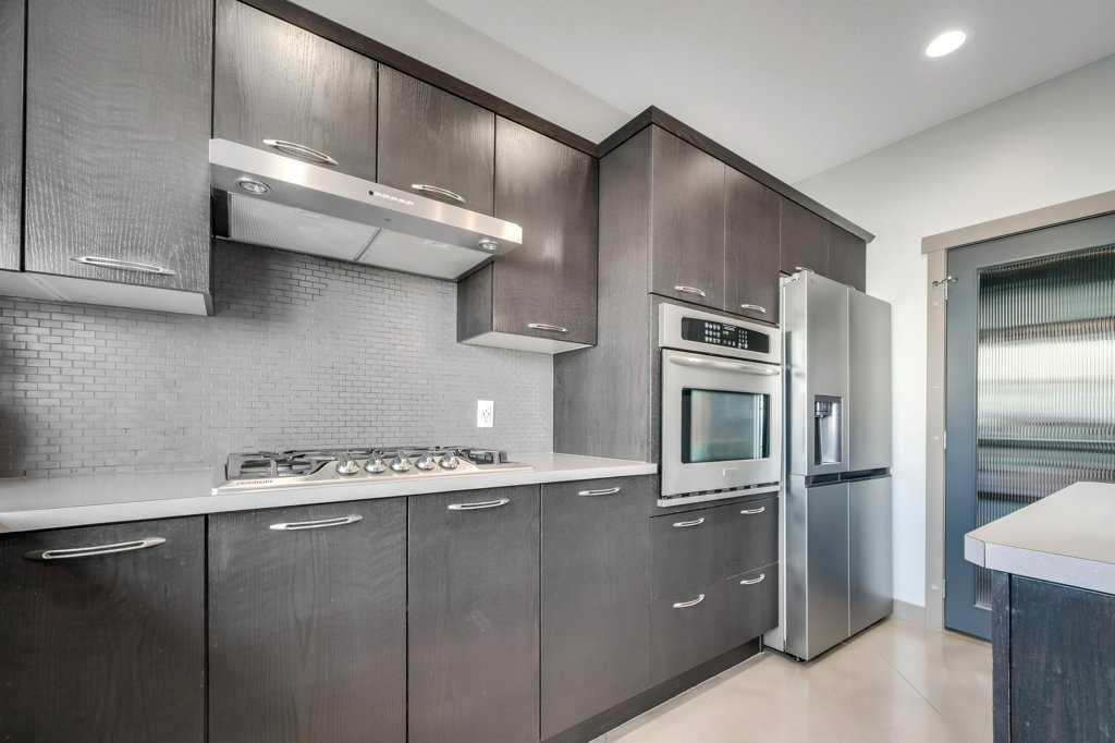 26 Copperfield Common Se, Calgary, AB - Indoor Photo Showing Kitchen With Stainless Steel Kitchen With Upgraded Kitchen