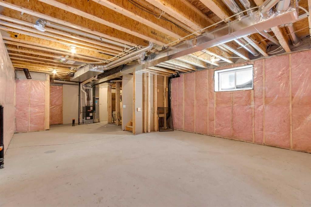 137 Copperhead Road Se, Calgary, AB - Indoor Photo Showing Basement