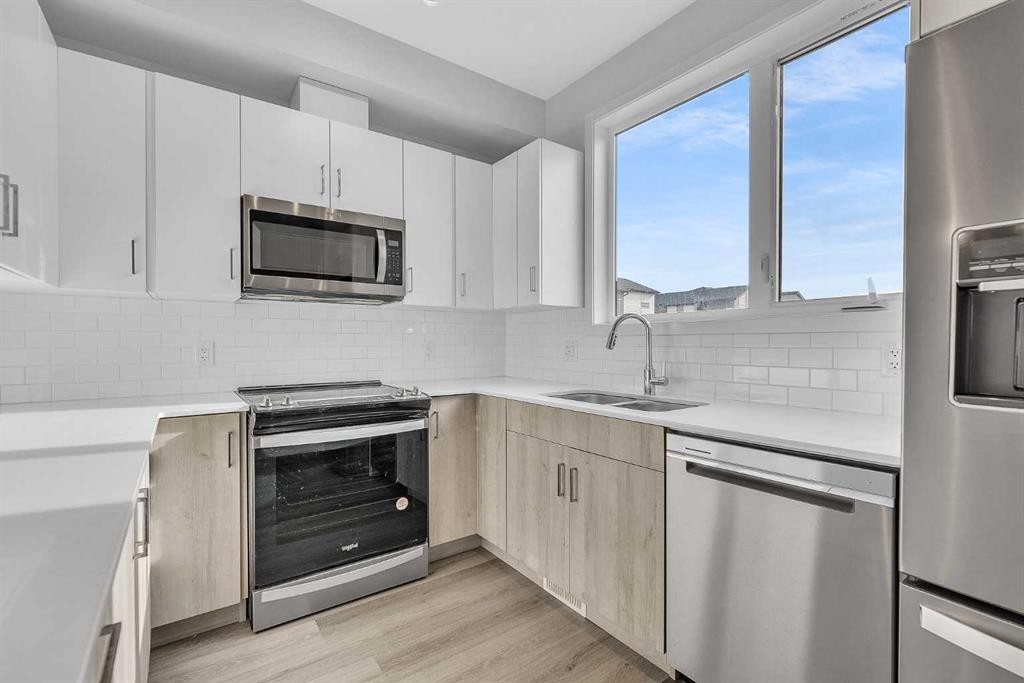 363-301 Redstone Boulevard Ne, Calgary, AB - Indoor Photo Showing Kitchen With Stainless Steel Kitchen With Double Sink With Upgraded Kitchen