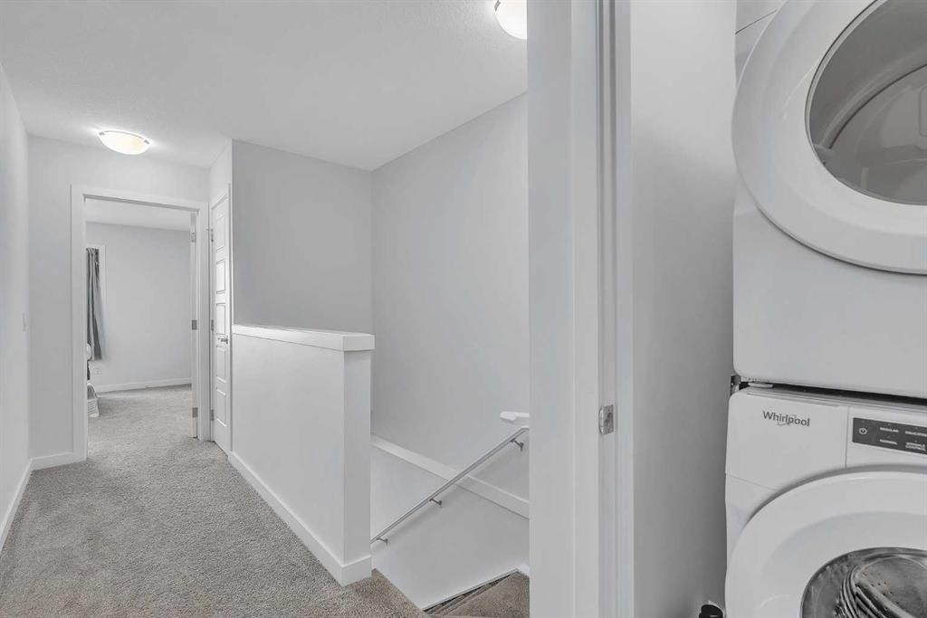 363-301 Redstone Boulevard Ne, Calgary, AB - Indoor Photo Showing Laundry Room