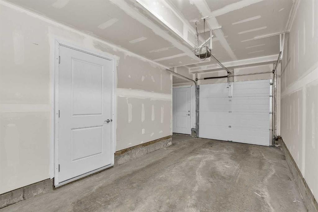 363-301 Redstone Boulevard Ne, Calgary, AB - Indoor Photo Showing Garage