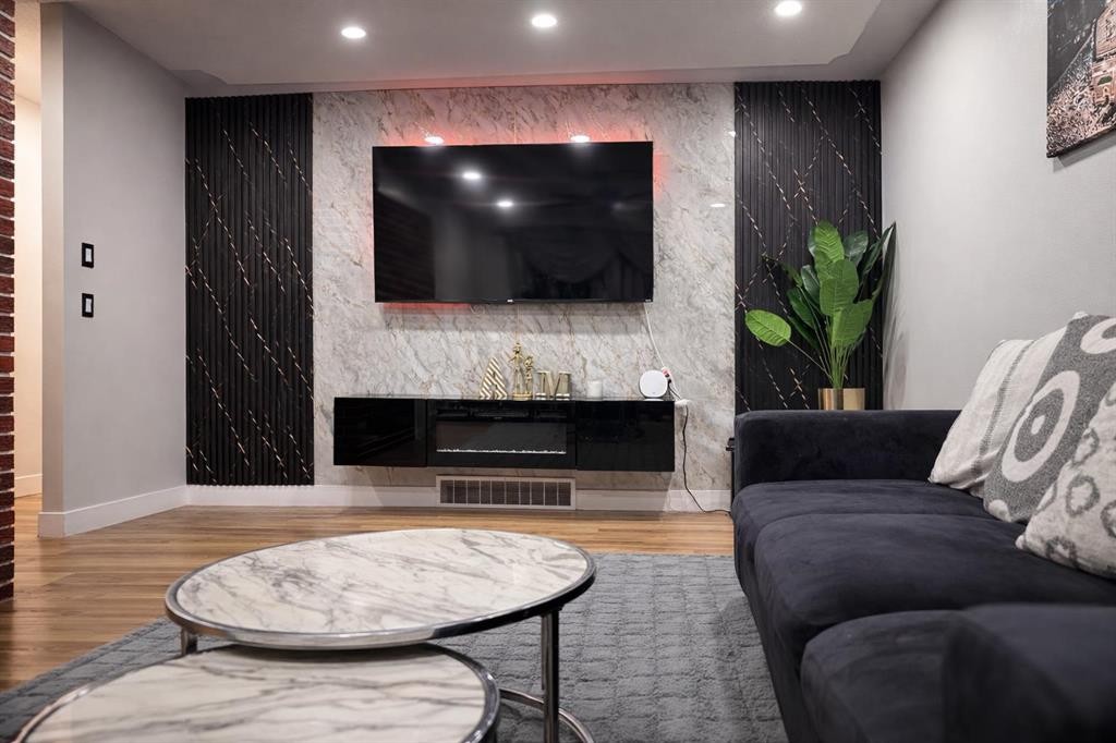 6003 Pinepoint Drive Ne, Calgary, AB - Indoor Photo Showing Living Room With Fireplace
