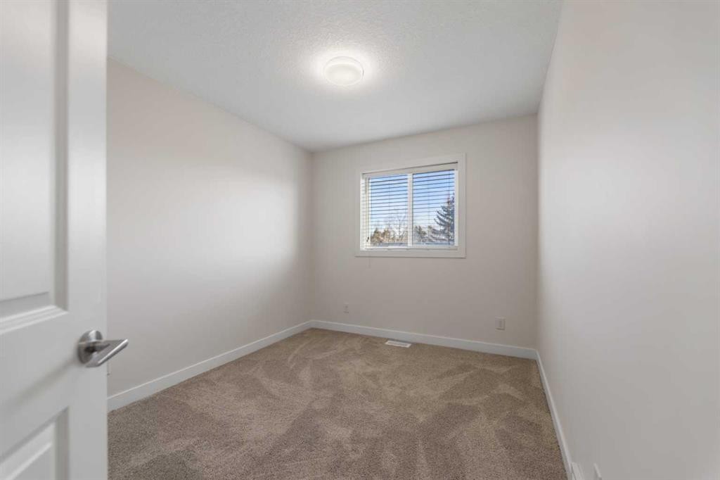 1006 Shantz Place, Crossfield, AB - Indoor Photo Showing Other Room