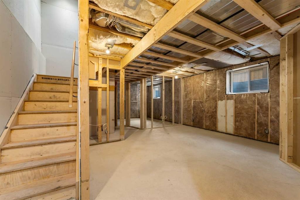 1006 Shantz Place, Crossfield, AB - Indoor Photo Showing Basement