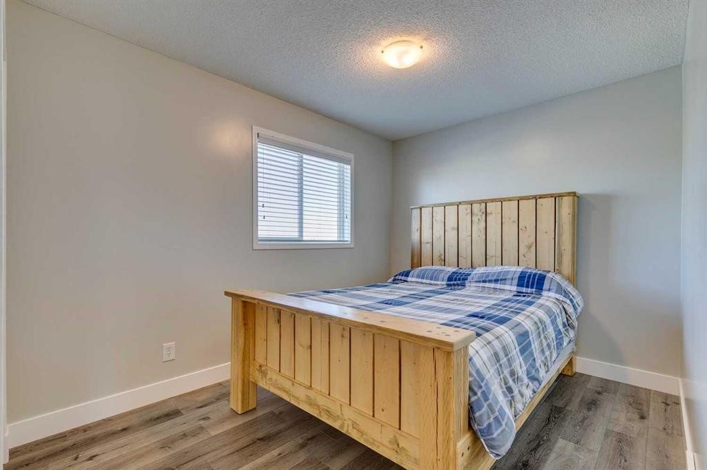 199 Everglen Way Sw, Calgary, AB - Indoor Photo Showing Bedroom