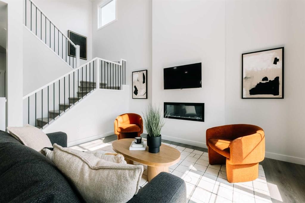 432 Ranch Gate, Strathmore, AB - Indoor Photo Showing Other Room With Fireplace