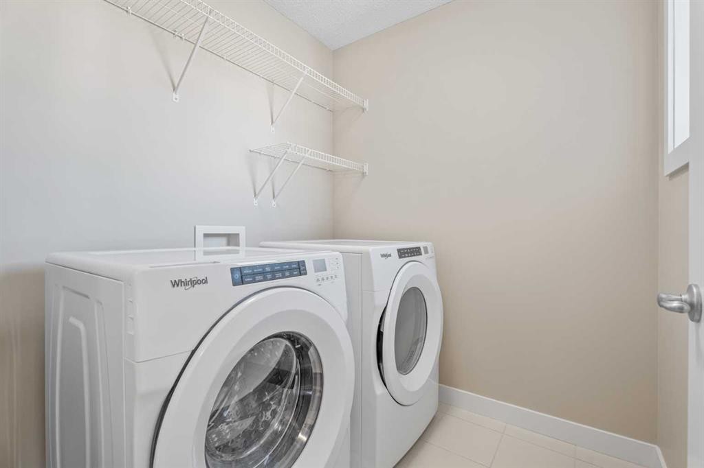 308 Chaparral Valley Way Se, Calgary, AB - Indoor Photo Showing Laundry Room