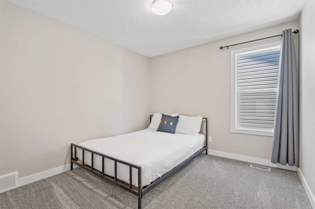 308 Chaparral Valley Way Se, Calgary, AB - Indoor Photo Showing Bedroom