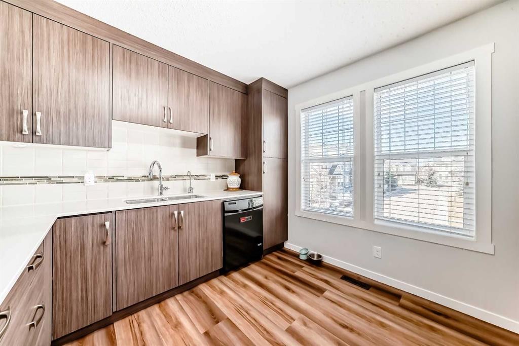 307 Auburn Bay Circle Se, Calgary, AB - Indoor Photo Showing Kitchen With Double Sink