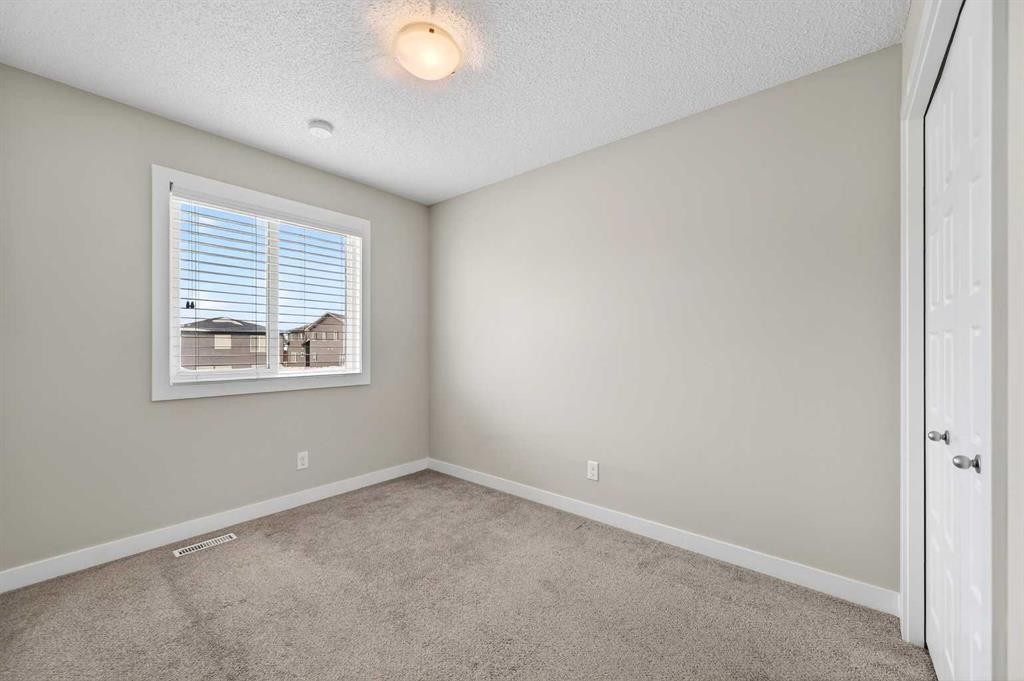 30 Sage Bluff Gate Nw, Calgary, AB - Indoor Photo Showing Other Room