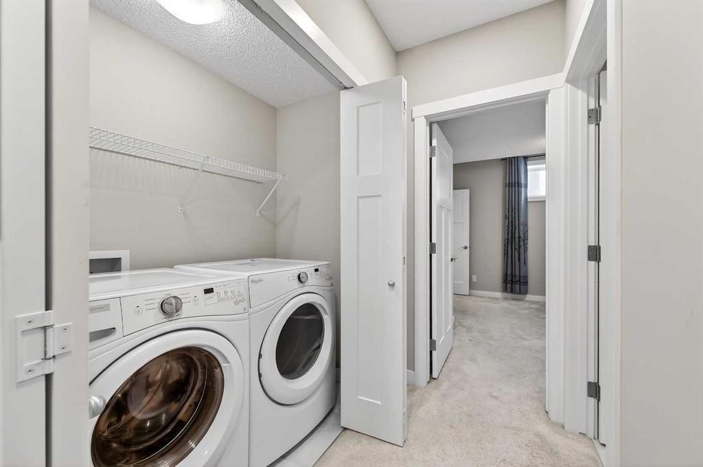 30 Sage Bluff Gate Nw, Calgary, AB - Indoor Photo Showing Laundry Room
