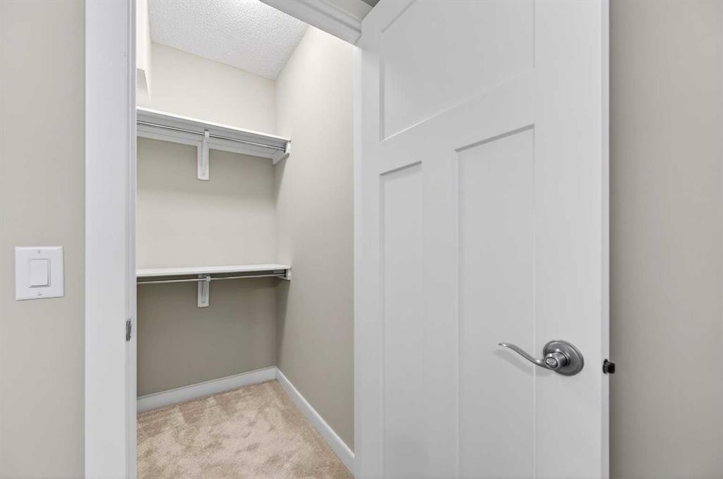 30 Sage Bluff Gate Nw, Calgary, AB - Indoor With Storage