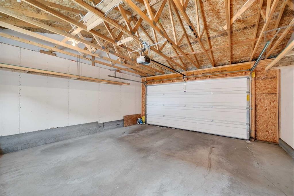30 Sage Bluff Gate Nw, Calgary, AB - Indoor Photo Showing Garage