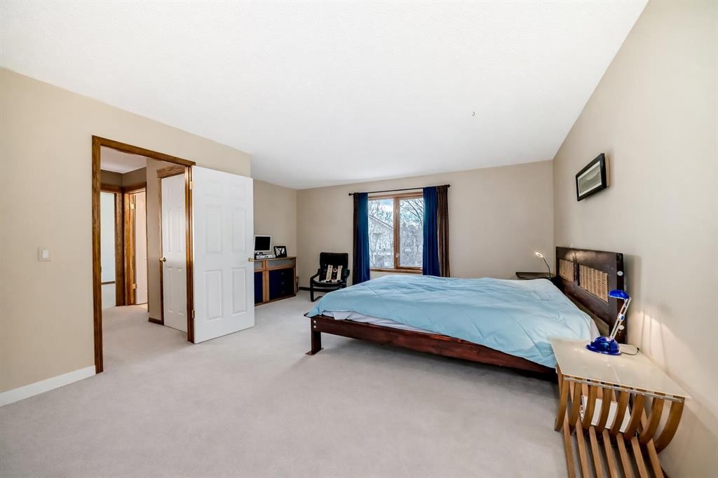 66 Tuscany Hills Point Nw, Calgary, AB - Indoor Photo Showing Bedroom