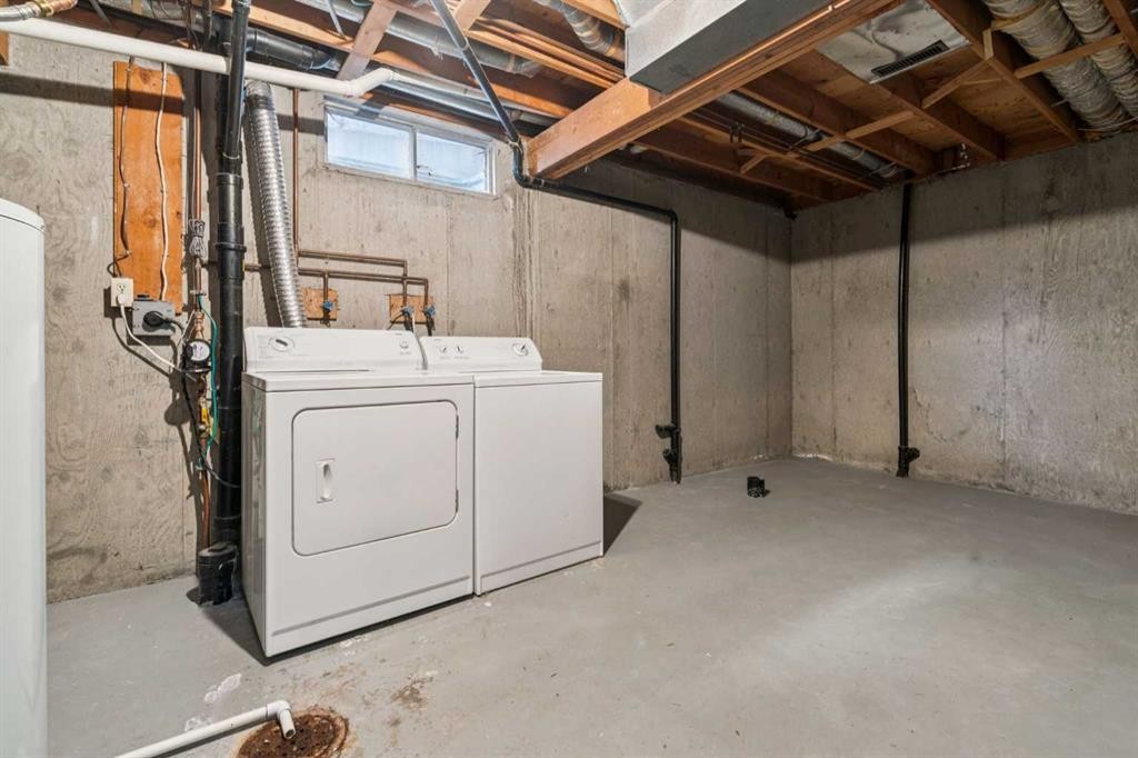 91 Edgehill Drive Nw, Calgary, AB - Indoor Photo Showing Laundry Room