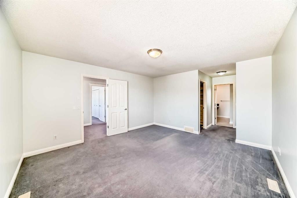 234 Panatella Boulevard Nw, Calgary, AB - Indoor Photo Showing Other Room
