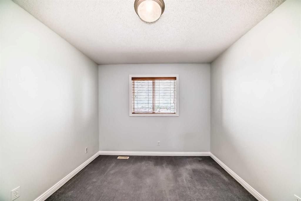 234 Panatella Boulevard Nw, Calgary, AB - Indoor Photo Showing Other Room