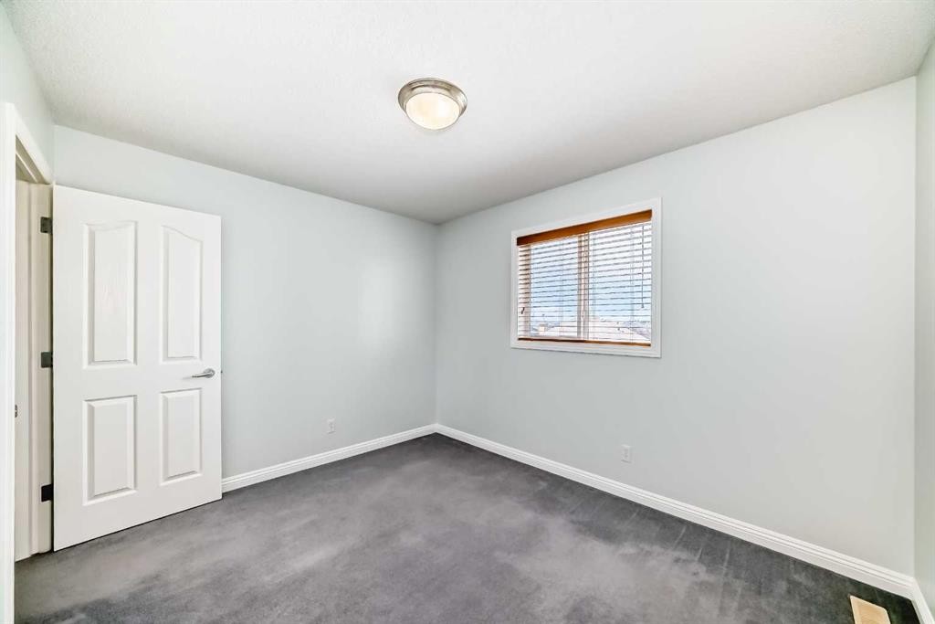 234 Panatella Boulevard Nw, Calgary, AB - Indoor Photo Showing Other Room