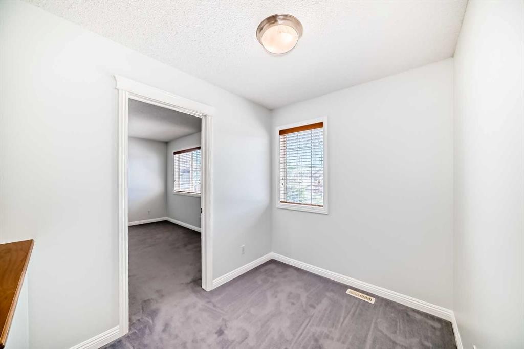 234 Panatella Boulevard Nw, Calgary, AB - Indoor Photo Showing Other Room