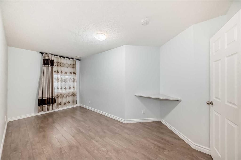 234 Panatella Boulevard Nw, Calgary, AB - Indoor Photo Showing Other Room