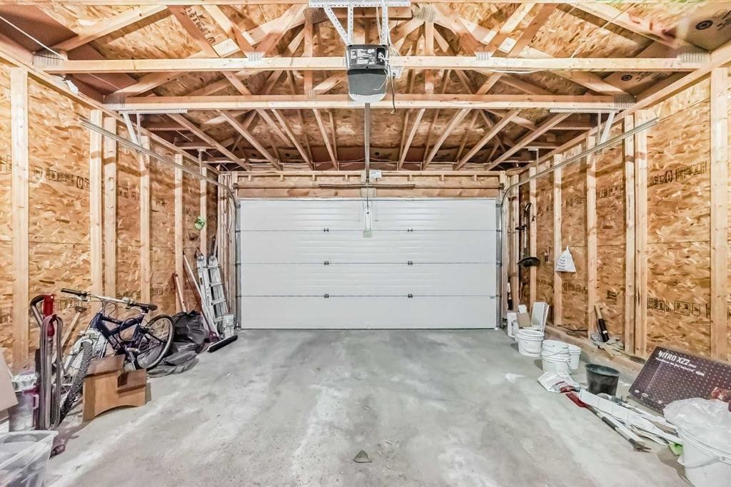 234 Panatella Boulevard Nw, Calgary, AB - Indoor Photo Showing Garage
