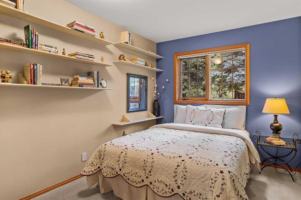 216 Bow River Drive, Harvie Heights, AB - Indoor Photo Showing Bedroom