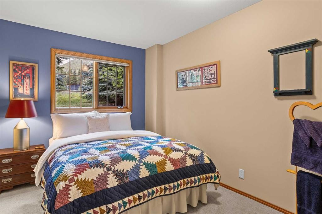216 Bow River Drive, Harvie Heights, AB - Indoor Photo Showing Bedroom