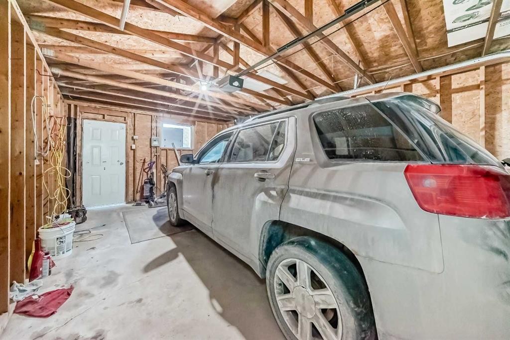 104 Falmere Way Ne, Calgary, AB - Indoor Photo Showing Garage